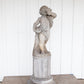 Concrete Cherub on wooden plinth