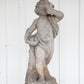 Concrete Cherub on wooden plinth