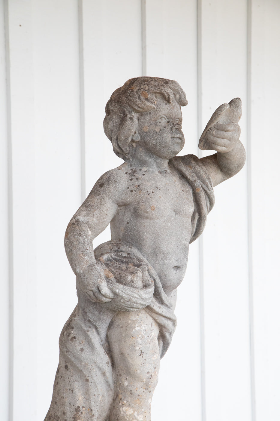 Concrete Cherub on wooden plinth