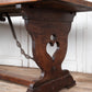 Table with Heart Carving and Iron Stretcher