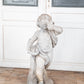 Concrete Cherub on wooden plinth