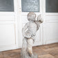 Concrete Cherub on wooden plinth