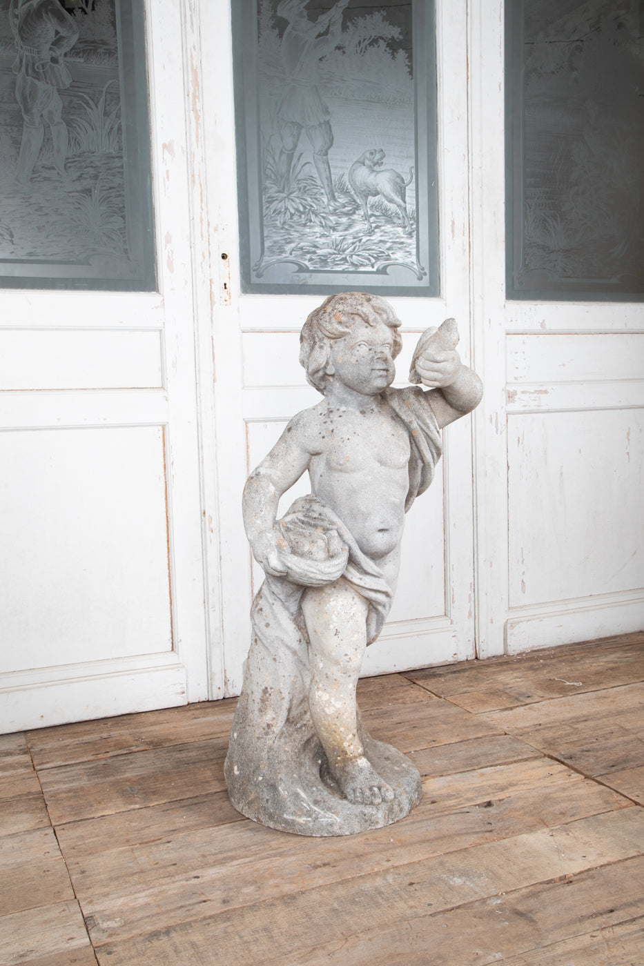 Concrete Cherub on wooden plinth