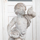 Concrete Cherub on wooden plinth