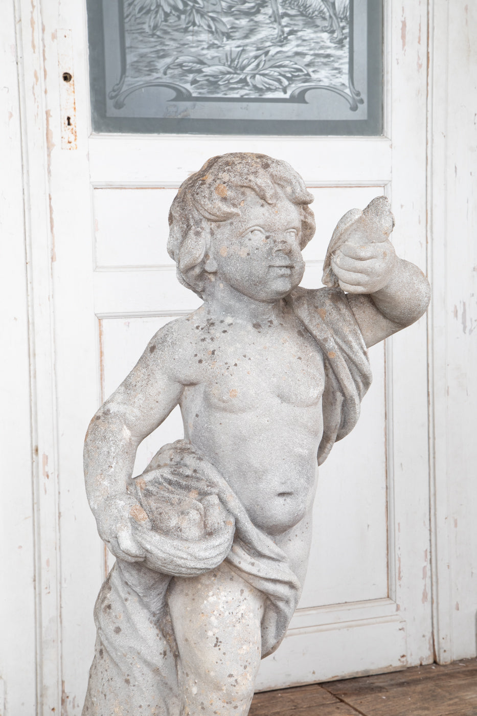 Concrete Cherub on wooden plinth