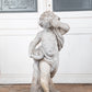 Concrete Cherub on wooden plinth
