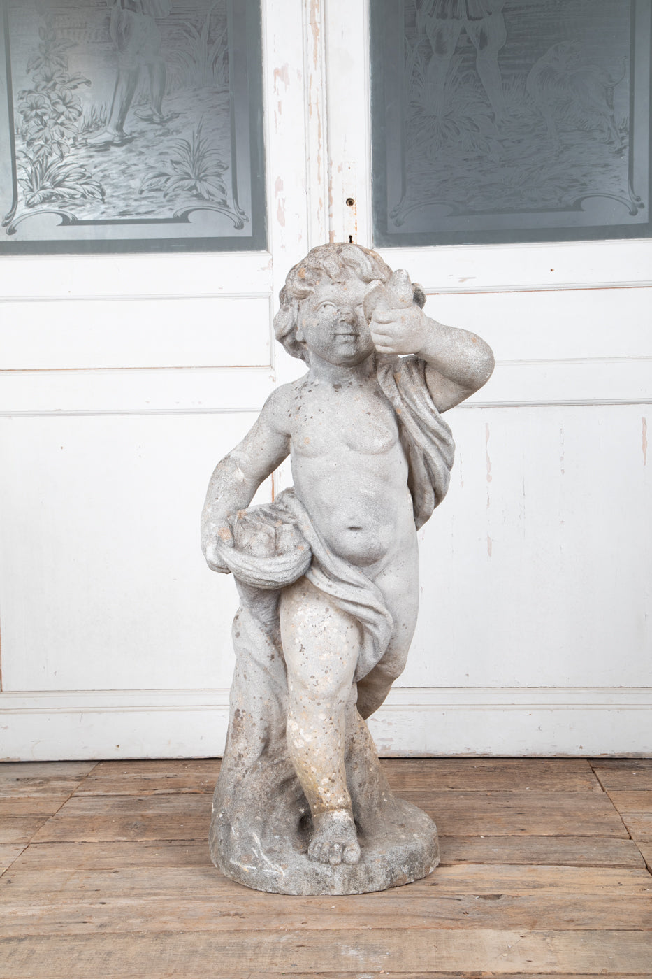 Concrete Cherub on wooden plinth