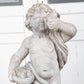 Concrete Cherub on wooden plinth