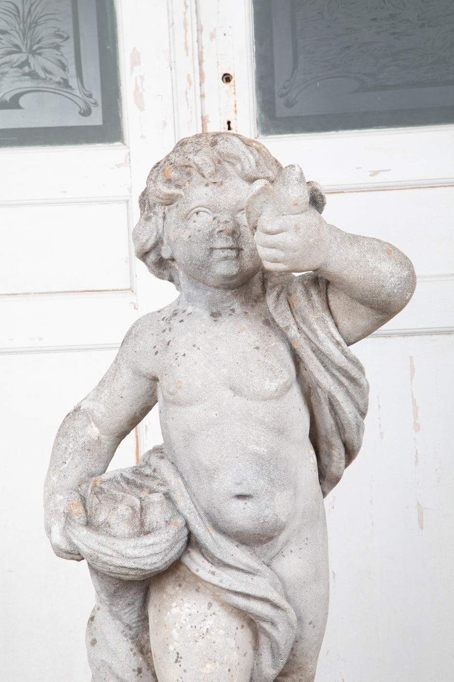 Concrete Cherub on wooden plinth